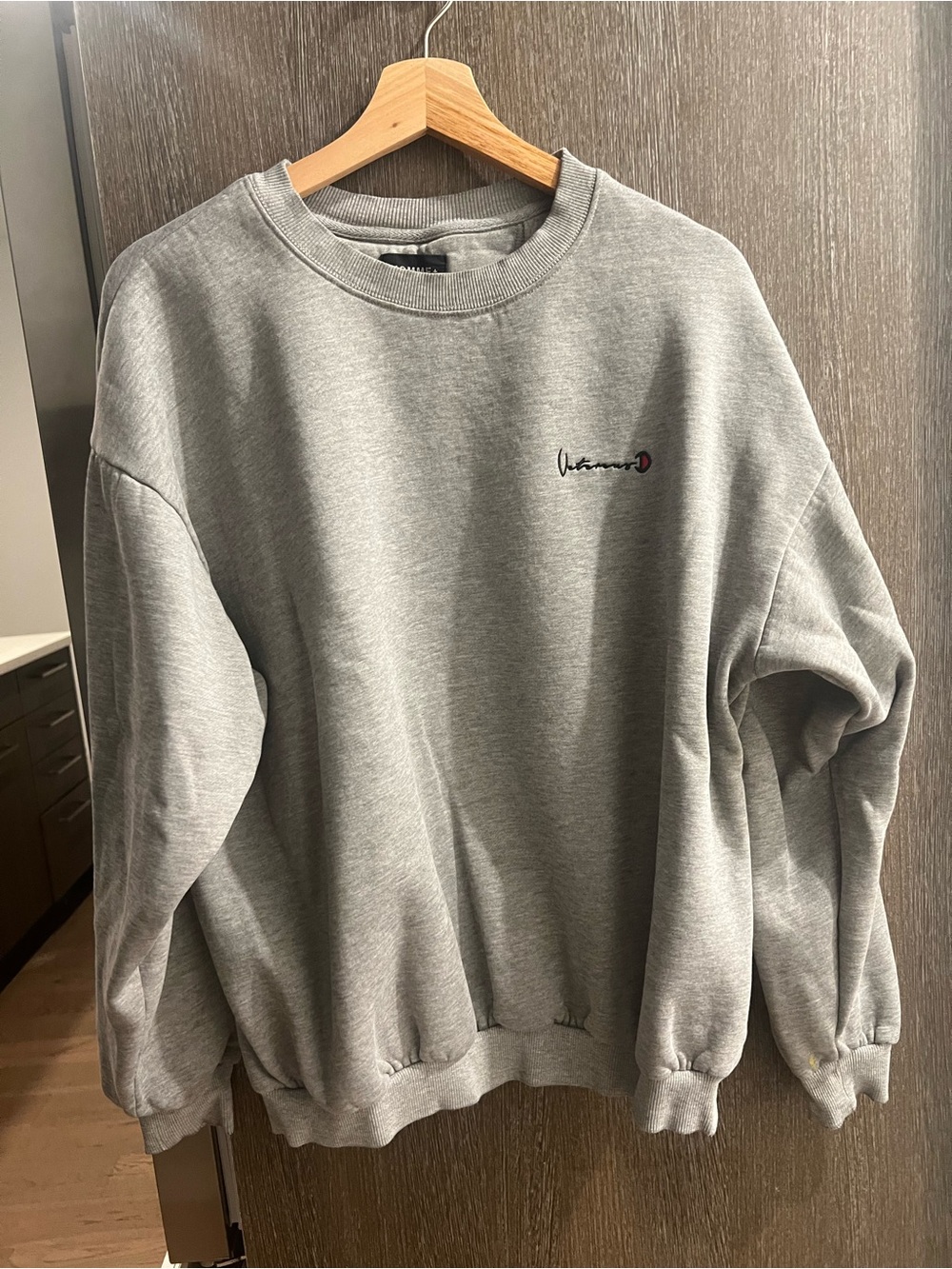 Classic Gray Crewneck Sweatshirt with Subtle Logo